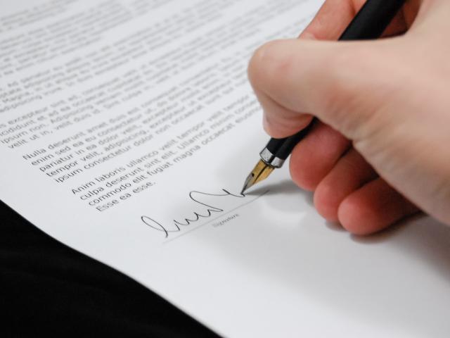 person signing document